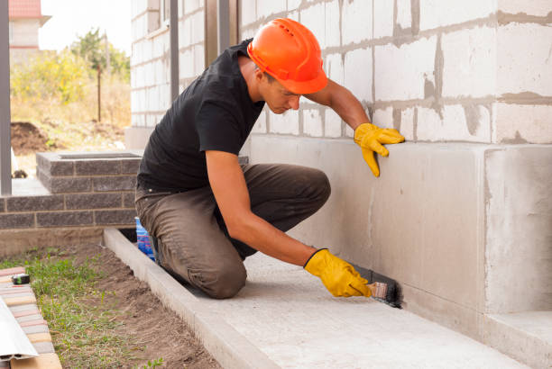 Waterproofing professionals working in Elwell, MI